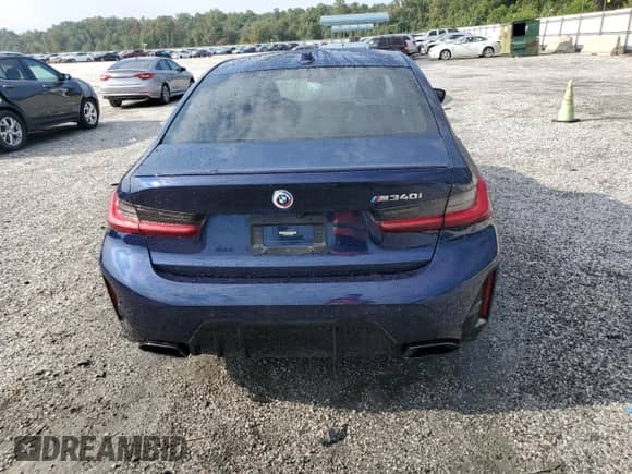 2023 BMW 3 Series M340i with VIN 3MW49FS04P8D04419, listed as a Copart auction lot 71625105 with 19,973 mi miles and Salvage title. Bid and sale history available at DreamBid. Image 6.
