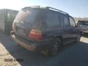 ✅ 2002 Toyota Land Cruiser • VIN: JTEHT05J122021423 • Lot: 75127634. Listed on Copart with Not provided. Free auction sales archive from the USA and detailed vehicle history report at DreamBid. Image 3.