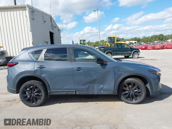 ✅ 2023 Mazda CX-5 S Preferred • VIN: JM3KFBCM8P0153809 • Lot: 43169696. Wystawiony na IAAI z przebiegiem 69 680 mil. Bezpłatny archiwum sprzedaży aukcyjnych z USA i szczegółowy raport historii pojazdu na DreamBid. Zdjęcie 13.