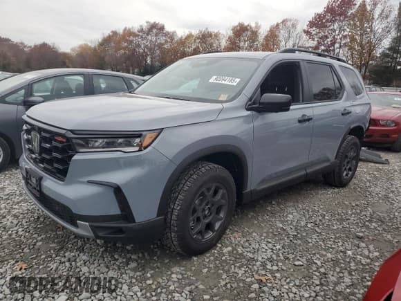 ✅ 2025 Honda Pilot TrailSport • VIN: 5FNYG1H6XSB160050 • Лот: 90994185. Опубликован ранее на Copart с пробегом 1 521 миль. Бесплатный доступ к архиву аукционных продаж из США и подробный отчёт об истории автомобиля на DreamBid. Изображение 1.