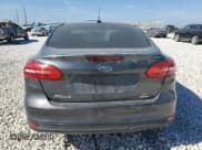 ✅ 2018 Ford Focus SE • VIN: 1FADP3FE7JL229461 • Lot: 82499245. Wystawiony na Copart z przebiegiem 66 300 mil. Bezpłatny archiwum sprzedaży aukcyjnych z USA i szczegółowy raport historii pojazdu na DreamBid. Zdjęcie 6.