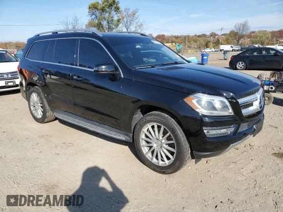 ✅ 2014 Mercedes-Benz GL 450 • VIN: 4JGDF7CE4EA389299 • Lot: 90535795. Listed on Copart with 139,587 mi. Free auction sales archive from the USA and detailed vehicle history report at DreamBid. Image 4.