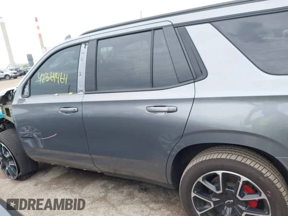 2021 Chevrolet Tahoe RST with VIN 1GNSKRKD8MR208630, listed as a IAAI auction lot 42364464 with 78,067 mi miles and . Bid and sale history available at DreamBid. Image 14.