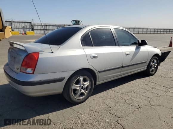 2003 Hyundai Elantra GLS z VIN KMHDN45D33U629413, wystawiony jako Copart lot #78414854 z przebiegiem 195 266 mil mil oraz Szkoda całkowita • Salvage title. Historia ofert i sprzedaży dostępna na DreamBid. Obrazek 3.