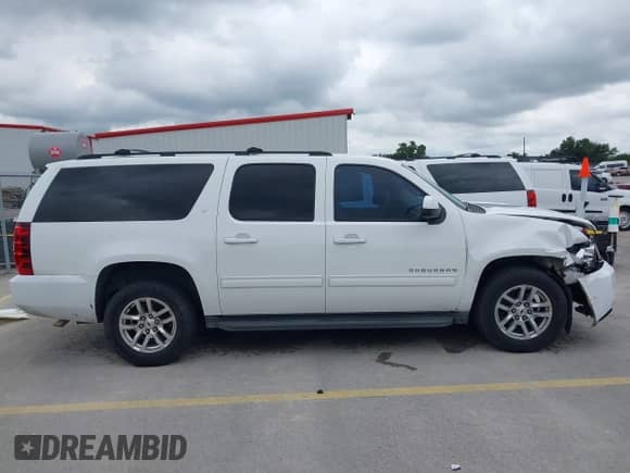 2014 Chevrolet Suburban LT z VIN 1GNSCJE02ER153469, wystawiony jako IAAI lot #42481563 z przebiegiem 249 441 mil mil oraz . Historia ofert i sprzedaży dostępna na DreamBid. Obrazek 14.