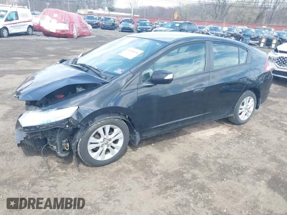 ✅ 2012 Honda Insight EX • VIN: JHMZE2H72CS000160 • Lot: 41909694. Listed on IAAI with 106,312 mi. Free auction sales archive from the USA and detailed vehicle history report at DreamBid. Image 2.