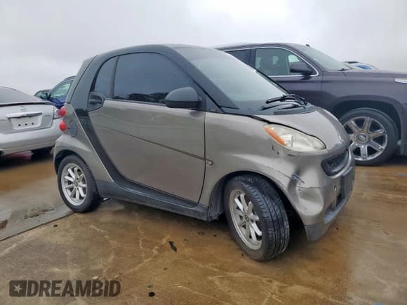 ✅ 2009 Smart fortwo Pure • VIN: WMEEJ31X49K233947 • Lot: 60535065. Listed on Copart with 48,669 mi. Free auction sales archive from the USA and detailed vehicle history report at DreamBid. Image 4.
