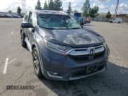 ✅ 2019 Honda CR-V Touring • VIN: 7FARW1H94KE018864 • Lot: 93495705. Listed on Copart with Not provided. Free auction sales archive from the USA and detailed vehicle history report at DreamBid. Image 14.