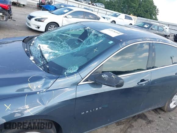 2019 Chevrolet Malibu LS with VIN 1G1ZB5STXKF184023, listed as a IAAI auction lot 42578554 with 107,729 mi miles and . Bid and sale history available at DreamBid. Image 12.