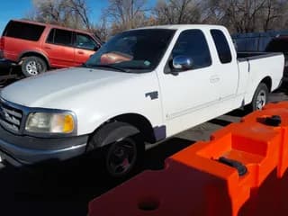✅ 2000 Ford F-150 XL • VIN: 1FTRX17L2YNB18915 • Лот: 43795895. Опубликован ранее на IAAI с пробегом Не указан. Бесплатный доступ к архиву аукционных продаж из США и подробный отчёт об истории автомобиля на DreamBid. Изображение 2.