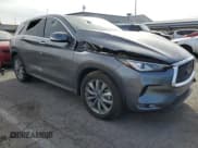 ✅ 2022 Infiniti QX50 Pure • VIN: 3PCAJ5AB5NF120898 • Lot: 69460483. Wystawiony na Copart z przebiegiem 10 424 mil. Bezpłatny archiwum sprzedaży aukcyjnych z USA i szczegółowy raport historii pojazdu na DreamBid. Zdjęcie 4.