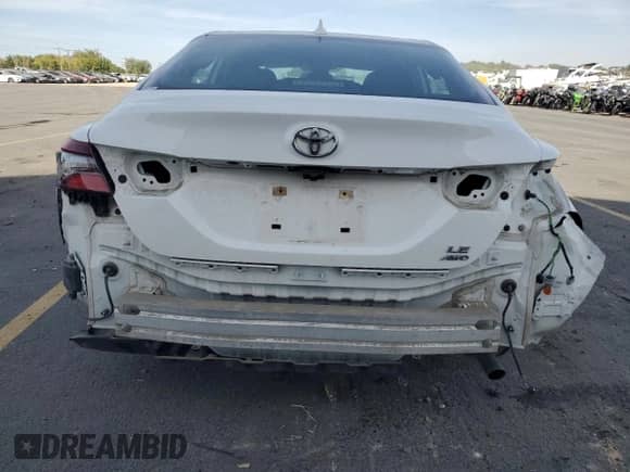 2021 Toyota Camry LE z VIN 4T1C11BK9MU044104, wystawiony jako Copart lot #82030915 z przebiegiem 51 409 mil mil oraz Szkoda całkowita • Salvage title. Historia ofert i sprzedaży dostępna na DreamBid. Obrazek 6.