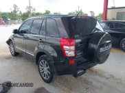 ✅ 2013 Suzuki Grand Vitara Limited • VIN: JS3TD0D75D4100331 • Lot: 42146459. Listed on IAAI with 133,359 mi. Free auction sales archive from the USA and detailed vehicle history report at DreamBid. Image 3.