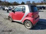 ✅ 2009 Smart fortwo Pure • VIN: WMEEJ31X89K240206 • Lot: 92012945. Listed on Copart with 62,396 mi. Free auction sales archive from the USA and detailed vehicle history report at DreamBid. Image 2.