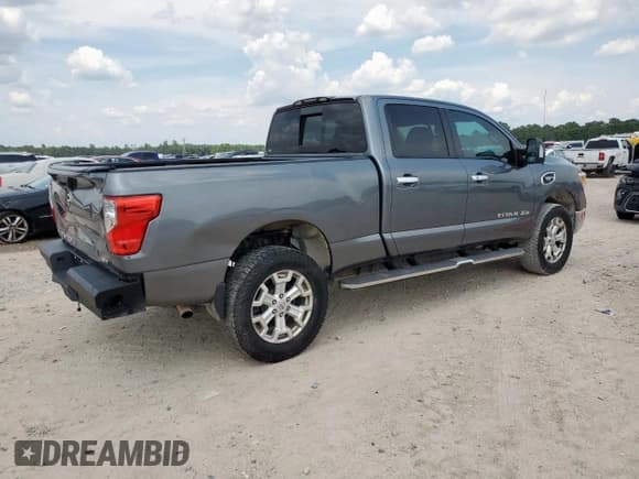 ✅ 2017 Nissan Titan SV • VIN: 1N6AA1F25HN544618 • Лот: 69580255. Опубликован ранее на Copart с пробегом 100 512 миль. Бесплатный доступ к архиву аукционных продаж из США и подробный отчёт об истории автомобиля на DreamBid. Изображение 3.