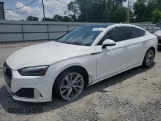 ✅ 2020 Audi A5 Sportback Premium • VIN: WAUANCF53LA014089 • Lot: 66083115. Listed on Copart with 66,145 mi. Free auction sales archive from the USA and detailed vehicle history report at DreamBid. Image 1.