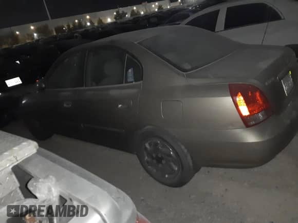 2002 Hyundai Elantra GLS z VIN KMHDN45D92U459167, wystawiony jako Copart lot #70104804 z przebiegiem Nie podano mil oraz Nie do naprawy • Non repairable. Historia ofert i sprzedaży dostępna na DreamBid. Obrazek 2.