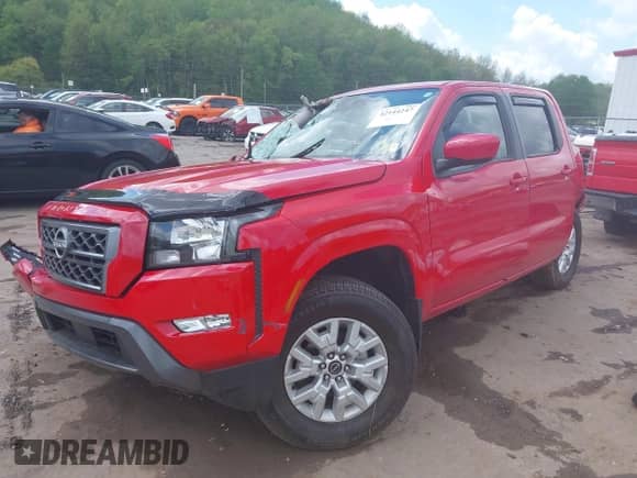 2024 Nissan Frontier SV with VIN 1N6ED1EKXRN601679, listed as a IAAI auction lot 42144247 with 13,486 mi miles and . Bid and sale history available at DreamBid. Image 2.