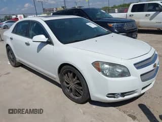 ✅ 2012 Chevrolet Malibu LTZ • VIN: 1G1ZG5E74CF135059 • Lot: 42883533. Listed on IAAI with 198,051 mi. Free auction sales archive from the USA and detailed vehicle history report at DreamBid. Image 1.