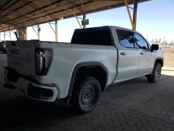 ✅ 2021 GMC Sierra 1500 AT4 • VIN: 3GTP9EED5MG119418 • Лот: 91658685. Опубликован ранее на Copart с пробегом 119 799 миль. Бесплатный доступ к архиву аукционных продаж из США и подробный отчёт об истории автомобиля на DreamBid. Изображение 3.