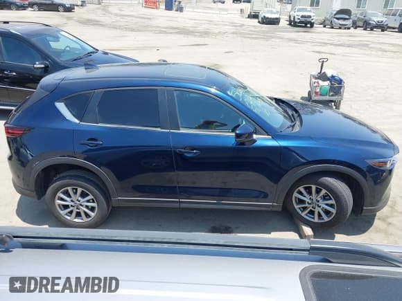 ✅ 2023 Mazda CX-5 S Preferred • VIN: JM3KFBCM4P0257505 • Lot: 42595704. Listed on IAAI with Not provided. Free auction sales archive from the USA and detailed vehicle history report at DreamBid. Image 12.