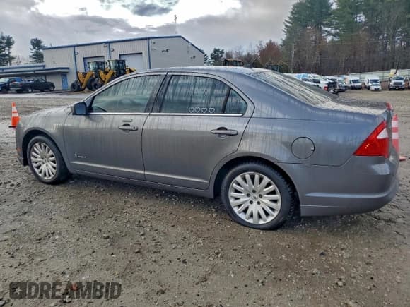 ✅ 2010 Ford Fusion Hybrid • VIN: 3FADP0L39AR166995 • Lot: 94321235. Wystawiony na Copart z przebiegiem 93 333 mil. Bezpłatny archiwum sprzedaży aukcyjnych z USA i szczegółowy raport historii pojazdu na DreamBid. Zdjęcie 2.