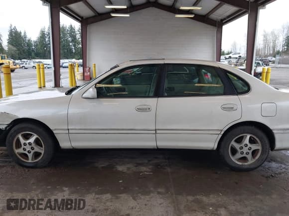 ✅ 1998 Toyota Avalon XL • VIN: 4T1BF18B5WU242038 • Лот: 41577342. Опубликован ранее на IAAI с пробегом 195 707 миль. Бесплатный доступ к архиву аукционных продаж из США и подробный отчёт об истории автомобиля на DreamBid. Изображение 14.