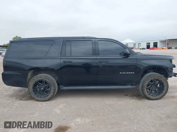 2020 Chevrolet Suburban LT z VIN 1GNSKHKC2LR143158, wystawiony jako IAAI lot #43036566 z przebiegiem 121 145 mil mil oraz . Historia ofert i sprzedaży dostępna na DreamBid. Obrazek 14.