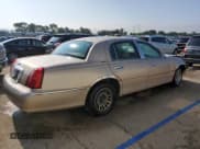 ✅ 1998 Lincoln Town Car Signature • VIN: 1LNFM82W7WY614094 • Lot: 59792735. Listed on Copart with 183,045 mi. Free auction sales archive from the USA and detailed vehicle history report at DreamBid. Image 3.