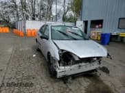 ✅ 2004 Ford Focus LX • VIN: 1FAFP33PX4W132594 • Lot: 65552465. Listed on Copart with 241,041 mi. Free auction sales archive from the USA and detailed vehicle history report at DreamBid. Image 11.