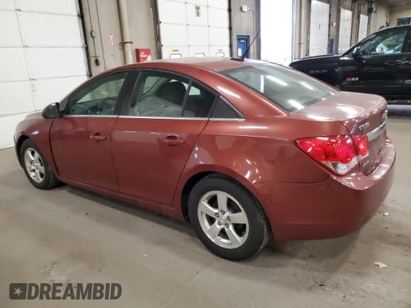✅ 2013 Chevrolet Cruze 1LT • VIN: 1G1PC5SB0D7203798 • Lot: 92064545. Listed on Copart with 181,401 mi. Free auction sales archive from the USA and detailed vehicle history report at DreamBid. Image 2.