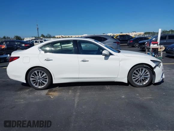 ✅ 2021 Infiniti Q50 Luxe • VIN: JN1EV7BP8MM701073 • Lot: 43707547. Wystawiony na IAAI z przebiegiem 51 990 mil. Bezpłatny archiwum sprzedaży aukcyjnych z USA i szczegółowy raport historii pojazdu na DreamBid. Zdjęcie 13.