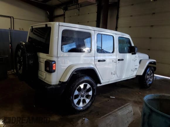 ✅ 2023 Jeep Wrangler Sahara • VIN: 1C4HJXEN0PW568561 • Lot: 48675435. Listed on Copart with 39,727 mi. Free auction sales archive from the USA and detailed vehicle history report at DreamBid. Image 3.