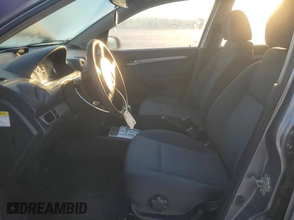 2009 Chevrolet Aveo 1LT z VIN KL1TD56E39B608752, wystawiony jako Copart lot #43245865 z przebiegiem 140 707 mil mil oraz Szkoda całkowita • Salvage title. Historia ofert i sprzedaży dostępna na DreamBid. Obrazek 7.