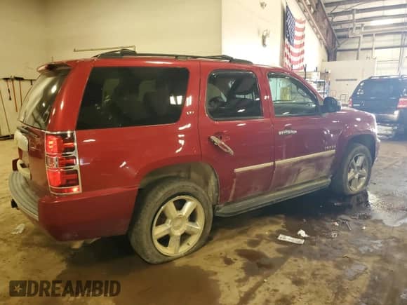 2013 Chevrolet Tahoe LTZ z VIN 1GNSKCE07DR373610, wystawiony jako Copart lot #67510235 z przebiegiem 157 323 mil mil oraz Czysty tytuł • Clean title. Historia ofert i sprzedaży dostępna na DreamBid. Obrazek 3.