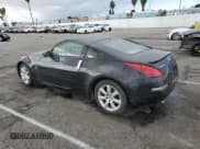 ✅ 2005 Nissan 350Z • VIN: JN1AZ34D65M601151 • Лот: 80855494. Опубликован ранее на Copart с пробегом Не указан. Бесплатный доступ к архиву аукционных продаж из США и подробный отчёт об истории автомобиля на DreamBid. Изображение 2.