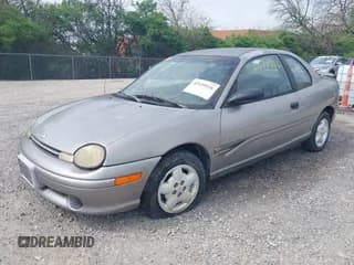✅ 1998 Dodge Neon • VIN: 1B3ES42YXWD746520 • Lot: 42149526. Listed on IAAI with 197,299 mi. Free auction sales archive from the USA and detailed vehicle history report at DreamBid. Image 2.