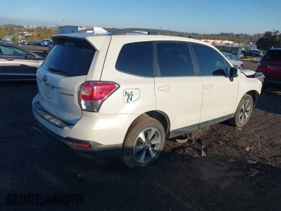 2018 Subaru Forester Limited with VIN JF2SJAJC3JH400496, listed as a IAAI auction lot 43511294 with 124,701 mi miles and . Bid and sale history available at DreamBid. Image 4.