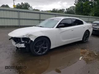 ✅ 2020 Dodge Charger SXT • VIN: 2C3CDXBG7LH244592 • Lot: 64571204. Wystawiony na Copart z przebiegiem 82 395 mil. Bezpłatny archiwum sprzedaży aukcyjnych z USA i szczegółowy raport historii pojazdu na DreamBid. Zdjęcie 1.