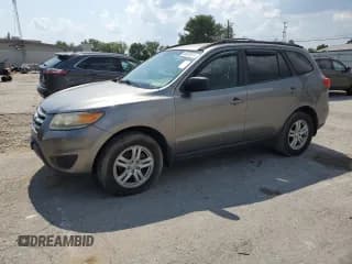 ✅ 2012 Hyundai Santa Fe GLS • VIN: 5XYZGDAB9CG114426 • Lot: 69819974. Listed on Copart with 233,854 mi. Free auction sales archive from the USA and detailed vehicle history report at DreamBid. Image 1.