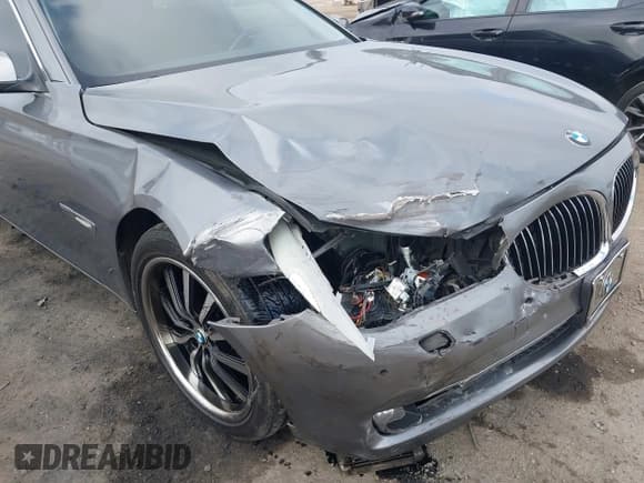 ✅ 2012 BMW 7 Series 740i • VIN: WBAKA4C52CC613676 • Lot: 42509312. Listed on IAAI with 113,971 mi. Free auction sales archive from the USA and detailed vehicle history report at DreamBid. Image 6.