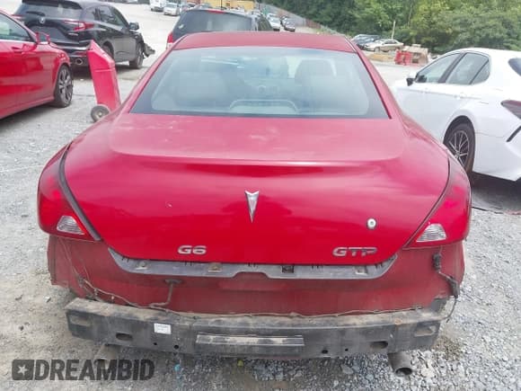 ✅ 2006 Pontiac G6 GTP • VIN: 1G2ZM151564200218 • Лот: 42890783. Опубликован ранее на IAAI с пробегом 145 860 миль. Бесплатный доступ к архиву аукционных продаж из США и подробный отчёт об истории автомобиля на DreamBid. Изображение 16.