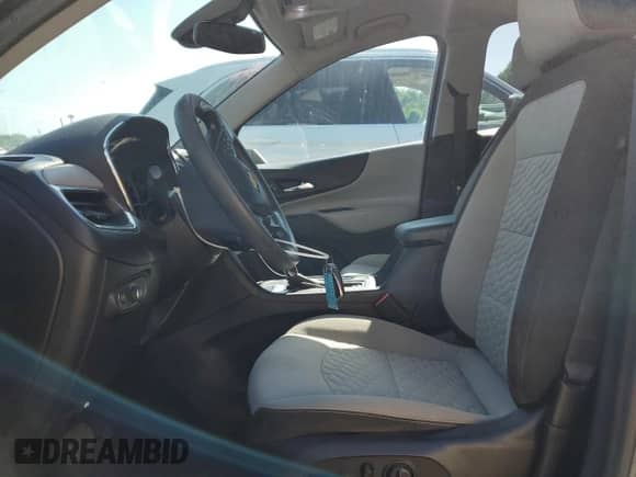 2020 Chevrolet Equinox LS z VIN 2GNAXSEV1L6270762, wystawiony jako Copart lot #69131035 z przebiegiem 153 694 mil mil oraz Szkoda całkowita • Salvage title. Historia ofert i sprzedaży dostępna na DreamBid. Obrazek 7.