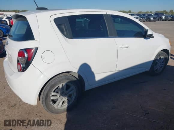 2015 Chevrolet Sonic LT with VIN 1G1JC6SH9F4100562, listed as a IAAI auction lot 43593493 with 127,498 mi miles and . Bid and sale history available at DreamBid. Image 4.