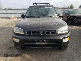 ✅ 1999 Toyota RAV4 • VIN: JT3GP10VXX7050857 • Лот: 78388524. Опубликован ранее на Copart с пробегом 234 908 миль. Бесплатный доступ к архиву аукционных продаж из США и подробный отчёт об истории автомобиля на DreamBid. Изображение 5.