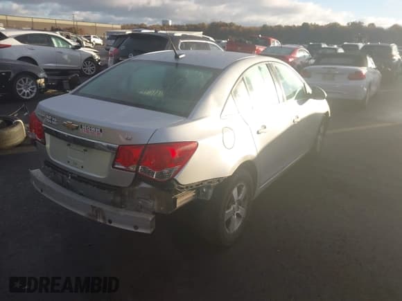 ✅ 2014 Chevrolet Cruze 1LT • VIN: 1G1PC5SB7E7219031 • Lot: 43581337. Listed on IAAI with 150,660 mi. Free auction sales archive from the USA and detailed vehicle history report at DreamBid. Image 4.