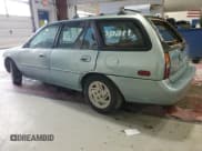 ✅ 1997 Ford Escort LX • VIN: 3FALP15P9VR107467 • Lot: 76061074. Listed on Copart with 69,873 mi. Free auction sales archive from the USA and detailed vehicle history report at DreamBid. Image 2.