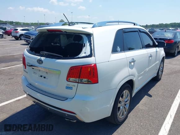 ✅ 2012 Kia Sorento SX • VIN: 5XYKWDA25CG227942 • Лот: 42582266. Опубликован ранее на IAAI с пробегом 137 921 миль. Бесплатный доступ к архиву аукционных продаж из США и подробный отчёт об истории автомобиля на DreamBid. Изображение 4.