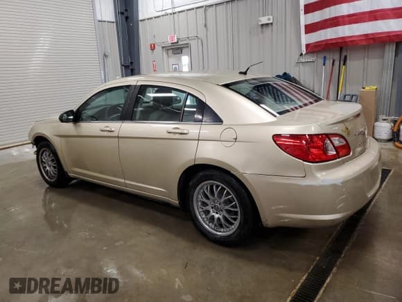 ✅ 2010 Chrysler Sebring Touring • VIN: 1C3CC4FB1AN163205 • Lot: 66724605. Listed on Copart with 163,006 mi. Free auction sales archive from the USA and detailed vehicle history report at DreamBid. Image 2.