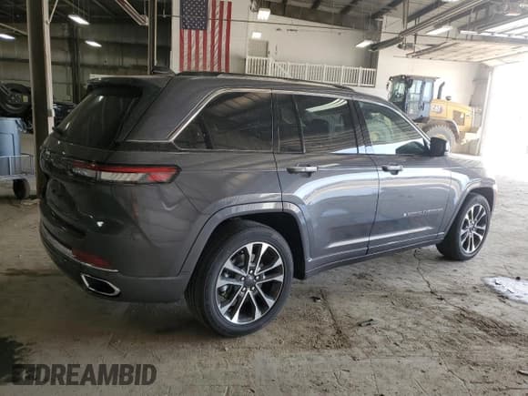 ✅ 2022 Jeep Grand Cherokee Overland • VIN: 1C4RJYD63N8764662 • Lot: 48997535. Listed on Copart with 21,412 mi. Free auction sales archive from the USA and detailed vehicle history report at DreamBid. Image 3.
